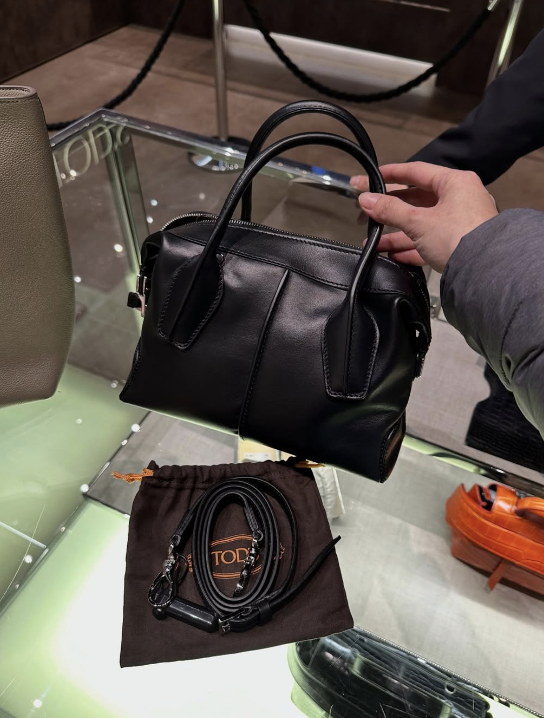 TOD’S, d-style, mini top handle bowler bag, with long strap, black